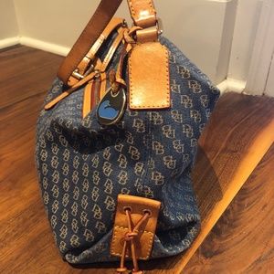 Dooney and Bourke navy and leather purse with matching wristlet